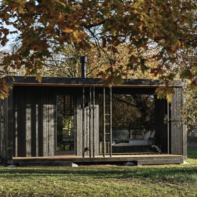 Contemporary Dark Cabin with Sliding Panels